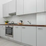 In The Center Of With Balcony And Separate Kitchen By Renters *