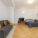 In The Center Of With Balcony And Separate Kitchen By Renters