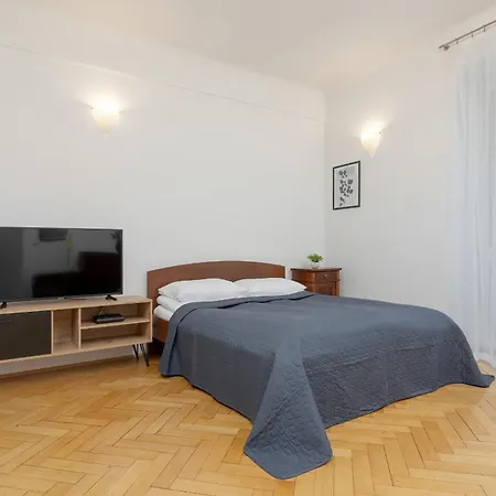 In The Center Of With Balcony And Separate Kitchen By Renters Apartment Warsaw