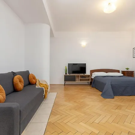 In The Center Of With Balcony And Separate Kitchen By Renters